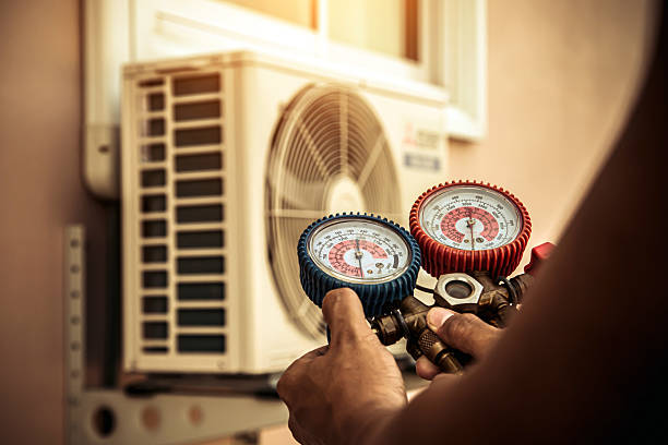 Professional Ac Installation technician working in Norwood, OK